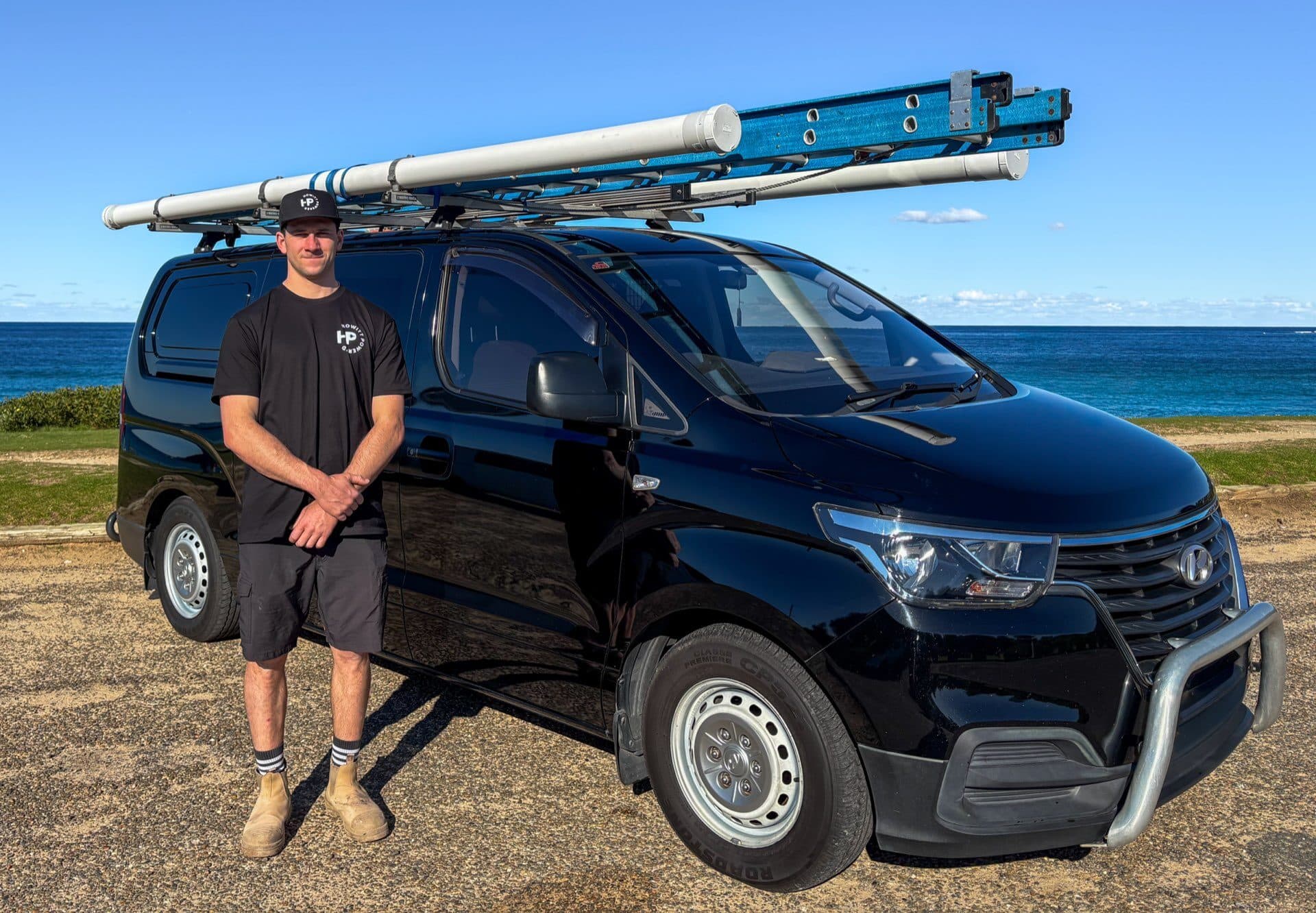 Max Howitt with the Howitt Powered van on the Northern Beaches